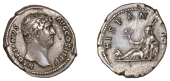 Hadrian, Denarius, 130-3, bare head right, rev. Hispania reclining left on rocks, holding branch, rabbit by feet,...
