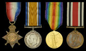 Family group:

Three: Sergeant H. G. Walne, Suffolk Yeomanry, who was commissioned Second Lieutenant in to the 2nd...