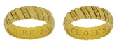 A gold posy ring, circa 1600-1640, the broad band decorated to the exterior with diagonal bands with ribbed beading...