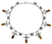 A silver, amber and chrysoprase necklace, design No. 8, by Georg Jensen, 1904-1908, designed as a series of stylised...
