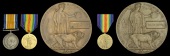 Family group:

Pair: Private W. F. Griffin, 3rd Regiment, South African Infantry, who was killed in action on the...