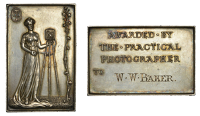 ENGLAND, The Practical Photographer, c. 1905, a silver award plaque by H. Bladon, robed female supporting a camera...