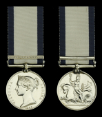 The Naval General Service medal awarded to Rear-Admiral F. J. Thomas, Royal Navy, for his services as acting...