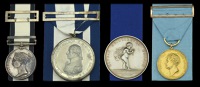 The fine Trafalgar and life saving group of four awarded to Captain Howard Lewis Parry, Royal Navy and H.M....