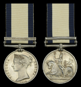 The Naval General Service medal awarded to John Wigginton for his services as a Private Royal Marines in the boats...