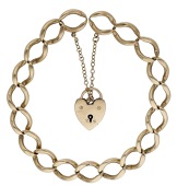 A 9ct gold bracelet, the curb-link chain with heart-shaped padlock clasp, UK hallmark, length 22cm.	 £500-£700