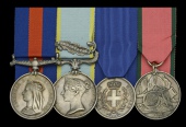 The New Zealand and Crimea group of four awarded to William H. Cruys, Boatswain, Royal Navy, who won the Sardinian...