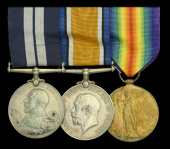 The rare Great War D.S.M. group of three to Corporal G. E. Hanham, Royal Marine Labour Corps, who was decorated for...