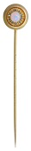 An antique opal and diamond stick pin, the opal cabochon bezel-set within a rose-cut diamond surround, bloomed...