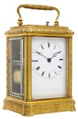 A French late 19th century gilt metal carriage clock.
Lever escapement, bell strike with push repeat, in a gorge...