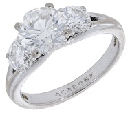A diamond ring, set with a brilliant-cut diamond, weighing 1.56 carats, with a similarly-cut diamond to either side,...