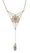 A turquoise and seed pearl spider pendant by Murrle Bennett & Co., circa 1900, designed as a gold wirework cobweb...