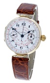 Metoda. A gold single button chronograph wristwatch, circa 1920.
Movement: jewelled manual winding.
Dial: white...