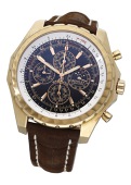 Breitling. A limited edition gold automatic perpetual calendar chronograph wristwatch with moon-phases, Ref....