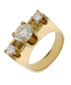 A diamond three stone ring, the central brilliant-cut diamond, weighing 2.17 carats, between two similarly-cut...