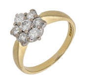A diamond cluster ring, set with brilliant-cut diamonds, mounted in 18ct gold, UK hallmark, total diamond weight...