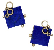 A pair of lapis lazuli cufflinks, the square-shaped lapis lazuli panels with applied pierced circular decoration, to...