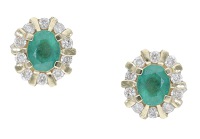 A pair of emerald and diamond cluster ear studs, each oval mixed-cut emerald set within a surround of brilliant-cut...