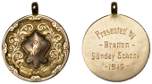 England, PETERBOROUGH, Bretton Sunday School, a circular 9ct gold fob medal, central shield in relief engraved ‘G...