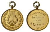 England, KETTERING, Sunday School Union, a circular 9ct gold fob medal decorated with a lyre surrounded by a laurel...