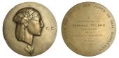 FRANCE, Nike, c. 1930, a large uniface Art Déco cast bronze medal, unsigned, bust of the Goddess right, flower...