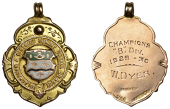 England, BLACKBURN & DISTRICT, Sunday School League, a shield-shaped 9ct gold fob medal, by Vaughton, inscribed...
