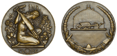 FRANCE, Flore, 1941, an Art Déco bronze medal by M. Delannoy, naked female kneeling to right, watering plants with...
