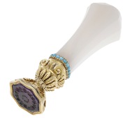 An early 19th century agate and gold desk seal, the flared faceted chalcedony handle above a border of small...