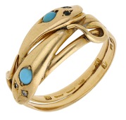 A turquoise and diamond serpent ring, 1872, modelled as two coiled serpents, each with a cabochon turquoise head and...