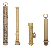 Two retractable toothpicks, one plain with hardstone seal terminal, signed ‘Sampson Mordan & Co, 15ct’, the...
