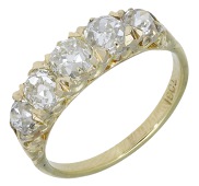 A diamond five stone ring, set with a graduated row of old brilliant-cut diamonds, stamped ‘18CT’, total diamond...