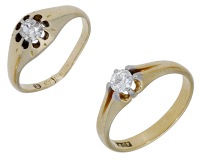 Two diamond single stone rings, each set with an old oval or brilliant-cut diamond, the first mounted in 18ct gold,...