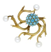 A gem-set brooch, circa 1964, the cluster of turquoise cabochons within a surround of scrolling textured fronds,...