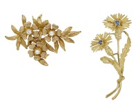 Two 18ct gold brooches by Cropp & Farr, the first with flowering thistles set with circular-cut sapphires, the...
