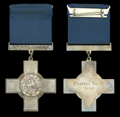 A George Cross (exchange Edward Medal) awarded to mineworker Mr. C. Smith, for his gallantry in rescuing a trapper...