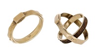 A 19th century memorial ring, the faceted and engraved brand with a swivel panel revealing plaited hairwork, stamped...