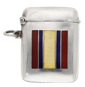 Of Boer War interest: A silver vesta case, the front enamelled with the Queen’s South Africa medal ribbon by...