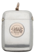 A silver vesta case, inset with gold  monogrammed roundel  and  thumbpiece, by Horton & Allday, Birmingham 1894,...