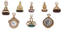 A collection of fobs, to include an early 19th century example set with a foil-backed cushion-shaped citrine, in a...