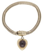 A mid 19th century garnet bracelet, the serpent-link chain with a foliate engraved barrel-shaped clasp, suspending a...