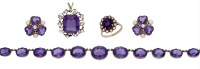 A 19th century amethyst necklace and three amethyst jewels, the 19th century rivière set with oval-cut amethysts in...