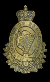 Carlow Rifles Glengarry Badge.
A good Victorian die-stamped blackened brass example with a Victorian crowned strap...