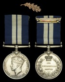 A Second War D.S.M. awarded to Chief Stoker J. E. Martin, Royal Navy, who was decorated for his gallantry in the...