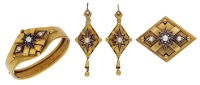 A late mid 19th century bangle, ear pendant and brooch suite, the tapered bangle with applied lozenge set with pearl...