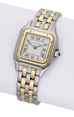 Cartier. A lady’s stainless steel and gold bracelet watch, Ref. 1120, Santos, circa 1995.
Movement: cal. 157,...