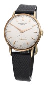 Patek Philippe. A gold wristwatch, circa 1960.
Movement: manual winding, no. 965387.
Dial: silvered, applied baton...