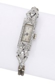 Swiss. A lady’s platinum and diamond-set Art Deco cocktail watch, circa 1930.
Movement: manual winding, 17...