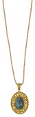 A turquoise pendant, the turquoise cabochon within a textured radiating surround, suspended from a fancy-link chain,...