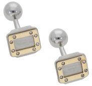 A pair of ‘Santos De Cartier’ cufflinks by Cartier, the rectangular bicolour panels with screwhead detail and...