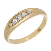 A late 19th century diamond ring, set with a graduated row of old brilliant-cut diamonds, mounted in gold, stamped...